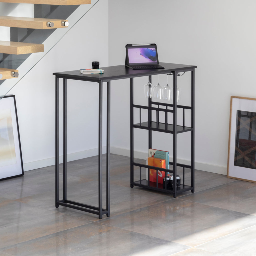 GAVIN - Mesa de bar 110x50 cm, altura 105 cm, con 2 estantes y portacopas, estructura de acero, estilo industrial, negro